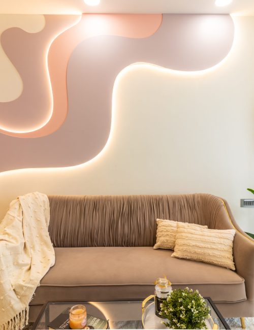 Stylish living room corner with a curved LED-lit accent wall